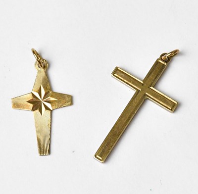 Lot 903 - Two 9ct gold pendants in the form of crosses,...
