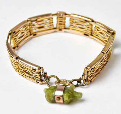 Lot 858 - A 9ct gold expanding gate link bracelet with...