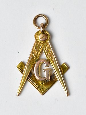 Lot 946 - A 9ct yellow gold Masonic fob or charm, with...