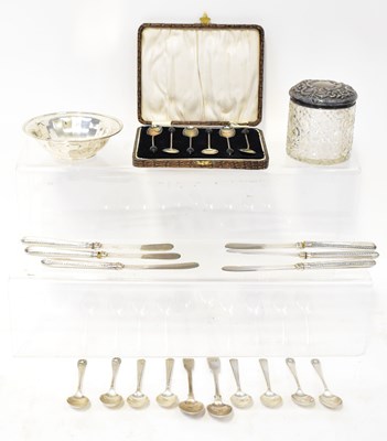Lot 745 - A small parcel of silver comprising a cased...