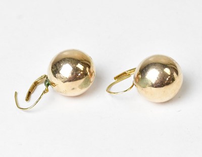 Lot 934 - A pair of Pena 14k ball-shaped earrings,...