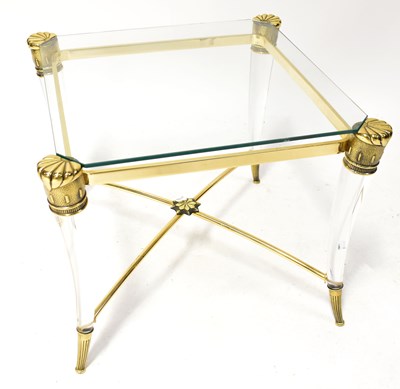 Lot 11 - A Maison Jansen style gilt metal glass-topped...