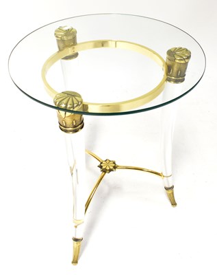 Lot 12 - A Maison Jansen style gilt metal glass-topped...