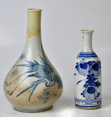 Lot 227 - A Korean blue and white ceramic vase of bottle...