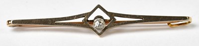Lot 876 - A 15ct gold bar brooch set with a central...