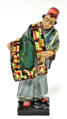 Lot 76 - ROYAL DOULTON; 'The Carpet Seller', HN1464,...