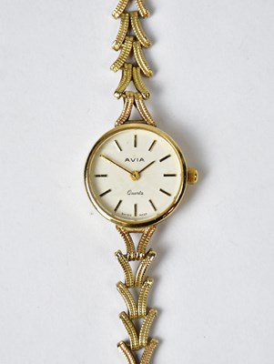 Lot 1052 - AVIA; a 9ct gold quartz cocktail watch, the...