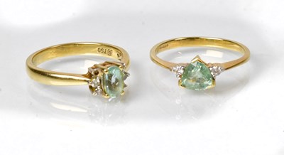 Lot 811 - Two 18ct yellow gold rings, each set with a...