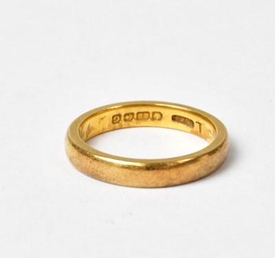 Lot 782 - A 22ct gold wedding band, stamped '22', size K,...