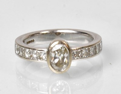 Lot 792 - THEO FENNELL; an 18ct white gold keystone ring...