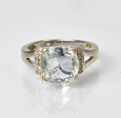 Lot 831 - A 9ct white gold ring, set with a facet cut...