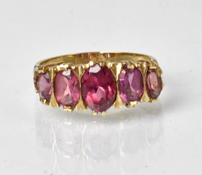 Lot 835 - A 9ct gold ring set with five graduated oval...