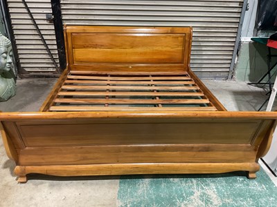 Lot 291 - A modern cherrywood 6ft sleigh bed, with slats....