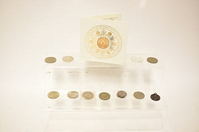 Lot 769 - A group of coins, including a Charles II half...