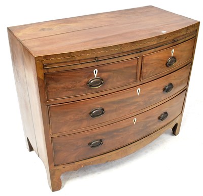 Lot 95 - A George III mahogany bow-fronted chest with...