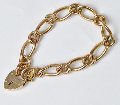 Lot 860 - A 9ct gold curb link chain bracelet stamped 9C,...
