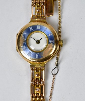 Lot 1056 - A 9ct gold ladies' wristwatch with enamelled...