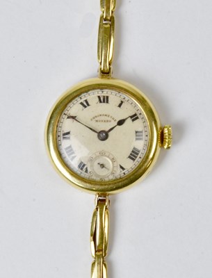 Lot 1049 - MOVADO; an 18ct gold ladies' wristwatch, the...