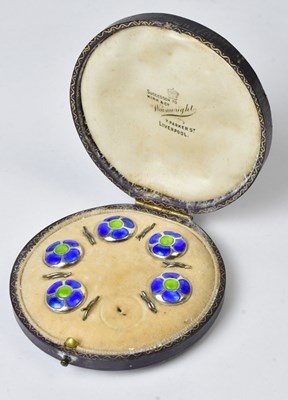 Lot 971 - A cased set of enamelled silver collar studs...