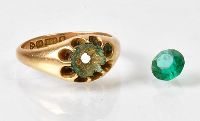 Lot 813 - A 15ct gold ring with a claw set green stone,...