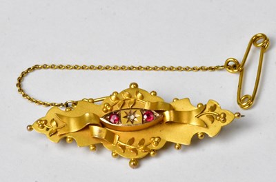 Lot 878 - An Edwardian 9ct gold brooch with applied...