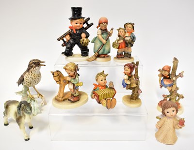 Lot 136 - GOEBEL HUMMEL; a collection of figures of...
