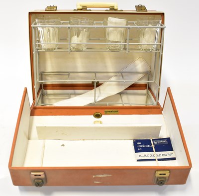 Lot 402 - BREXTON; a vintage orange vinyl and...