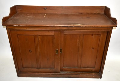 Lot 1625 - An old pine school cupboard