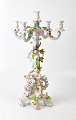 Lot 102 - A Continental porcelain four-branch...