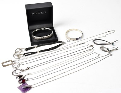 Lot 973 - Seven silver necklaces, comprising a boxed...
