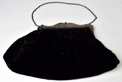 Lot 530 - A 1920s velvet purse with hallmarked silver...