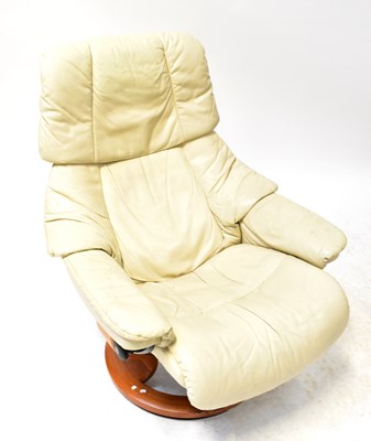 Lot 14 - STRESSLESS; a cream leather reclining chair.