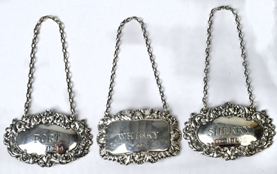 Lot 729 - Three silver decanter labels, comprising a...