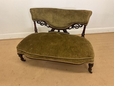 Lot 283 - A Victorian walnut framed and upholstered low...