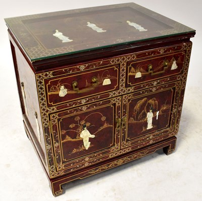 Lot 48 - A red lacquered gilt-heightened chinoiserie...