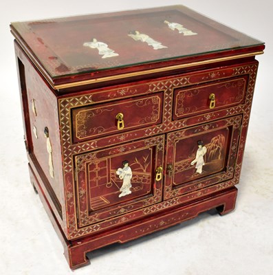 Lot 54 - A red lacquered gilt-heightened chinoiserie...