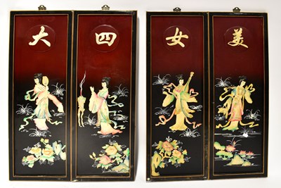 Lot 212 - A set of four lacquered panels, with applied...