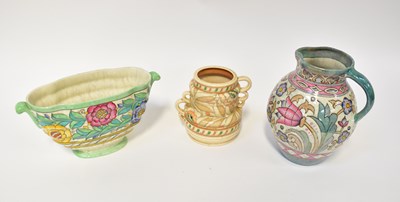 Lot 105 - CROWN DUCAL; a Charlotte Rhead design shaped...
