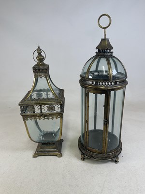 Lot 80 - A cylindrical brass framed candle holder...