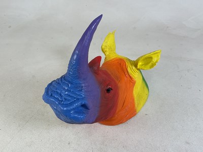 Lot 5 - A modern wall mounted fibreglass rhinocerous...