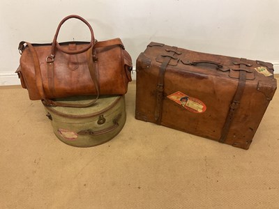 Lot 72 - A large early 20th century leather strap bound...