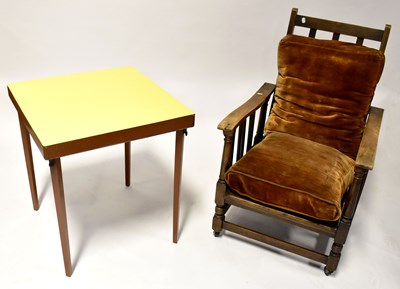 Lot 16 - A 1930s mahogany lounger with turned legs on...