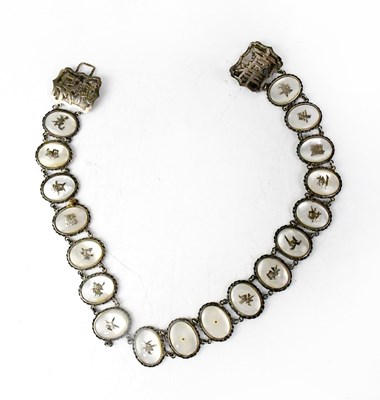Lot 854 - A c.1920s Chinese silver and mother of pearl...