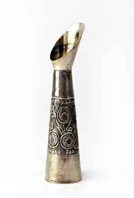 Lot 850 - A sterling silver miniature decorative pitcher...