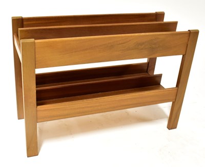 Lot 6 - A mid-20th century teak magazine rack with two...