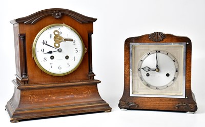 Lot 74 - An Art Deco oak eight-day mantel clock, the...