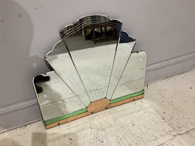 Lot 66 - An Art Deco shaped wall mirror, 77 x 86cm.