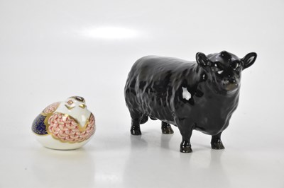 Lot 207 - BESWICK; a ceramic figure of a black cow and a...