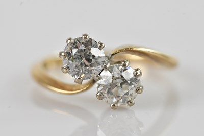 Lot 476 - A yellow metal diamond set crossover dress...