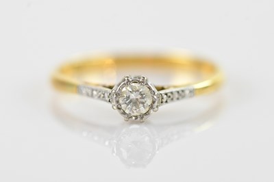 Lot 528 - A yellow and white metal diamond illusion set...